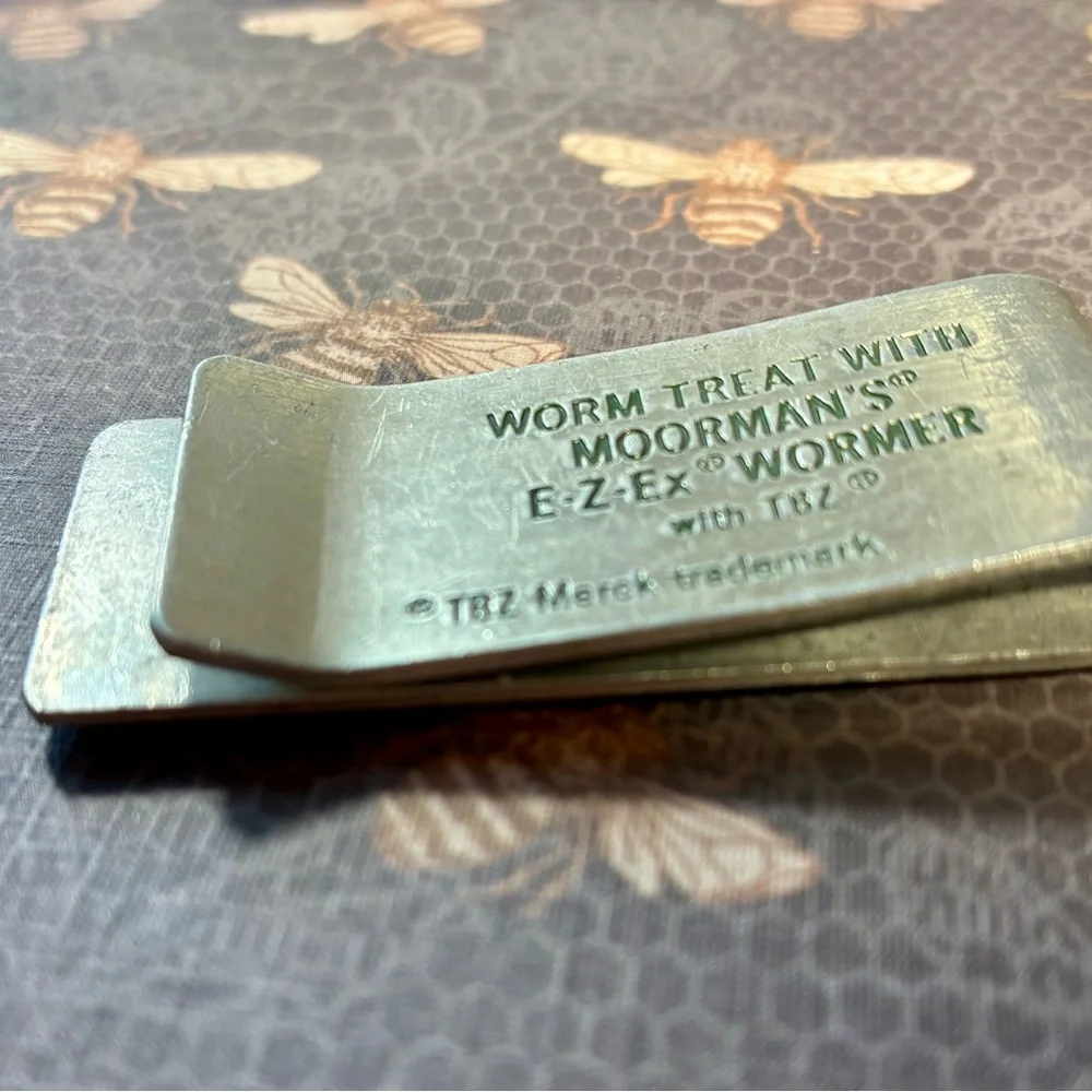 Vintage Money Clip with Penny Design Advertising Worm Treatment on other side
